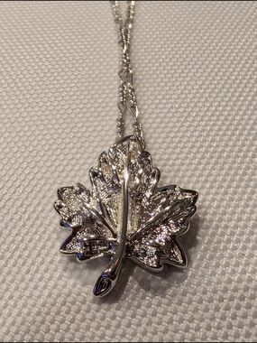D'orlan Maple leaf pendant and silver necklace